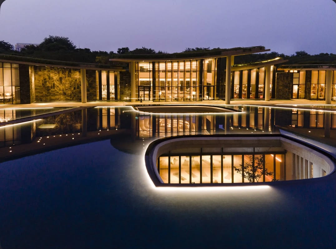 Aravali Crest - Clubhouse at dusk